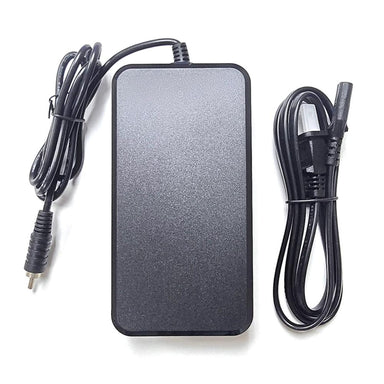 Black power adapter with cables on a white background