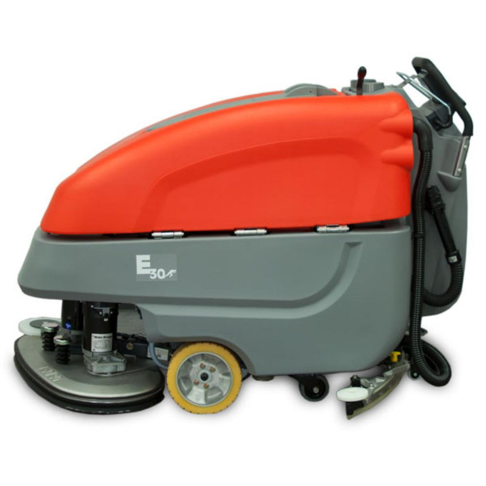 Left side view of orange and grey push e3030 medium sized floor scrubber 