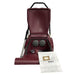 Open dirt container for large red vacuum cleaner with white catch bag