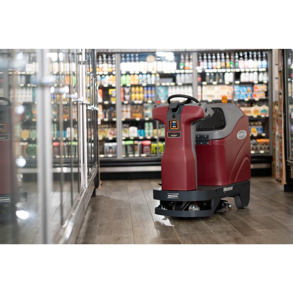 Minute man Max ride RoboScrub autonomous scrubber in the middle of a grocery store isle.