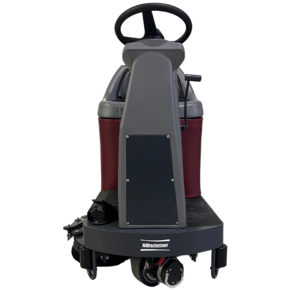 Front view highlighting grey steering column for minute man riding max ride 26 floor scrubber 