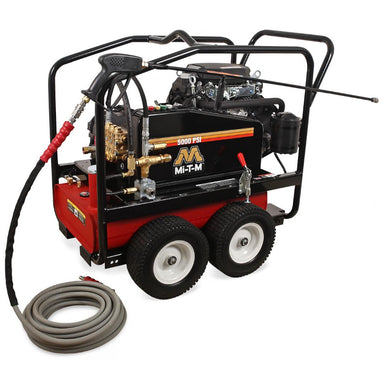 Red and black pressure washer with hose on a white background