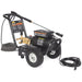 Black pressure washer with hose and nozzle on a white background