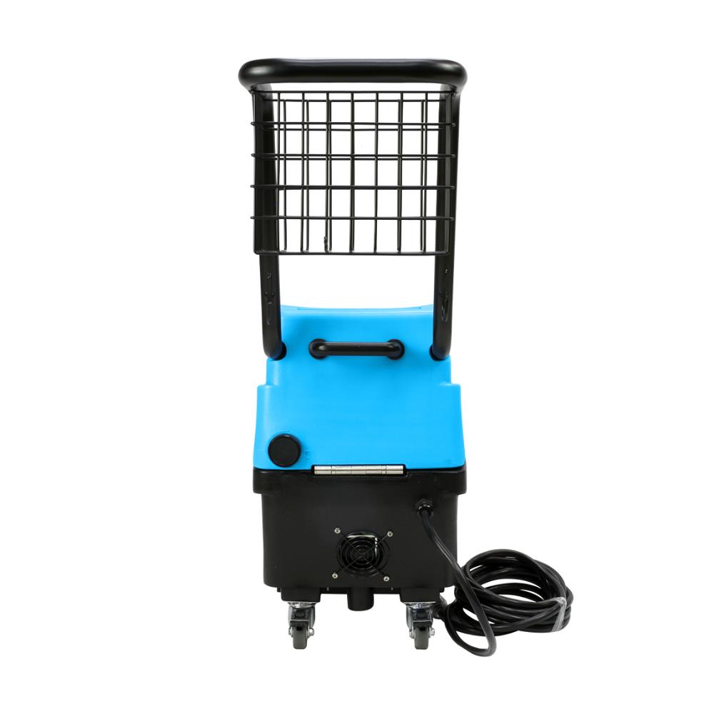 Blue and black machine with a wire basket on a white background