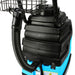 Close-up of a black and blue industrial vacuum cleaner on a white background