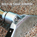 Metal tool with a clear sight window on a textured background