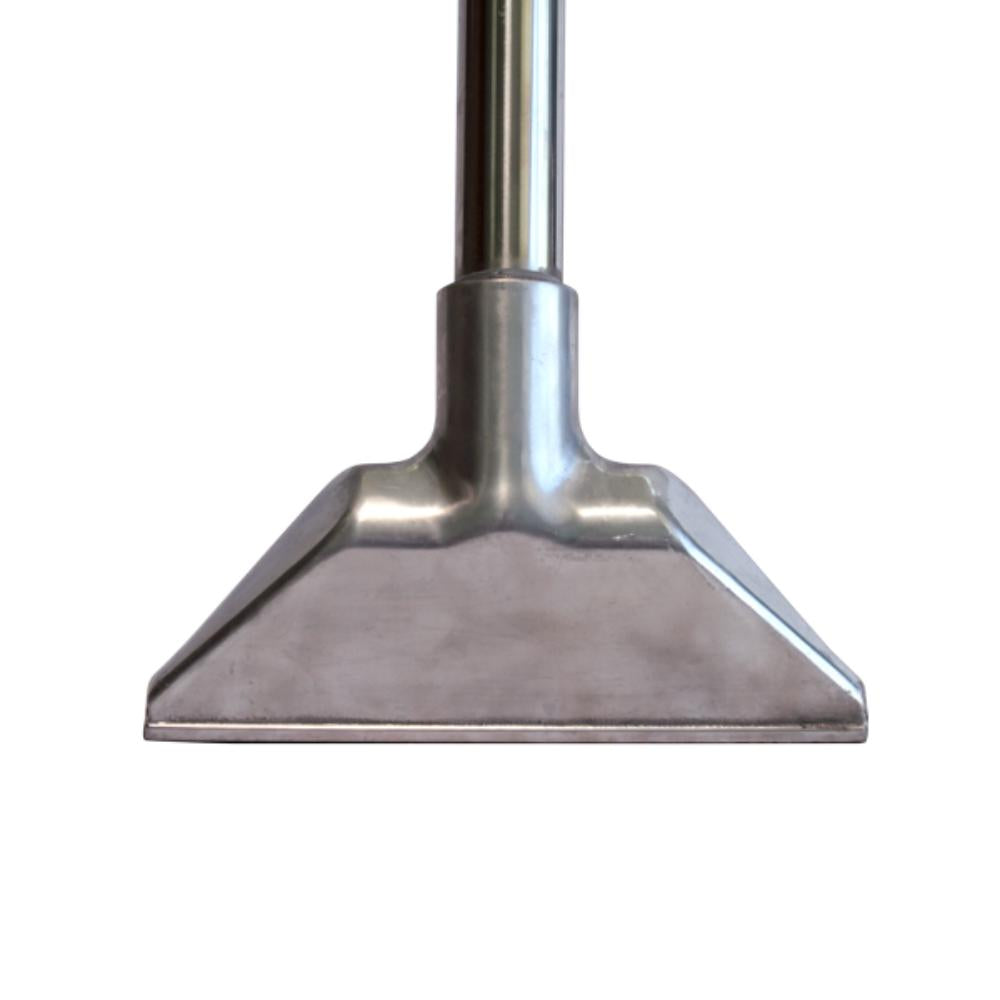 Metallic vacuum cleaner head on a white background