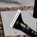 Close-up of carpet wand with a white rubber blade on a blurred background