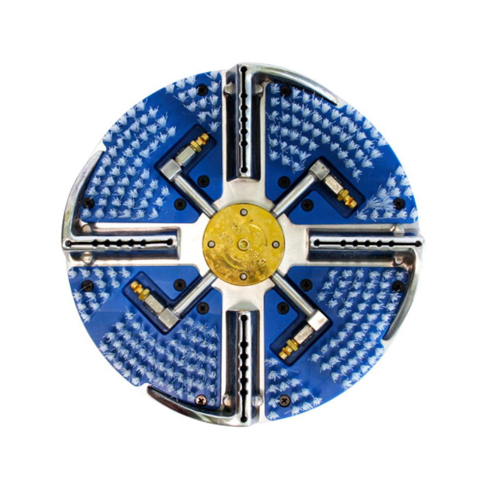 Circular metal component with blue textured surface and gold center on a white background