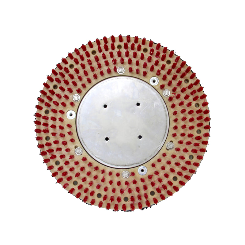 Round cleaning brush with red bristles on a white background