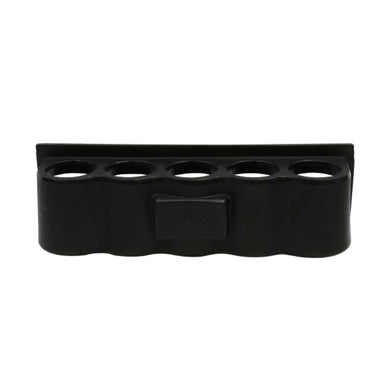 Black rubber mat with multiple circular holes on a white background