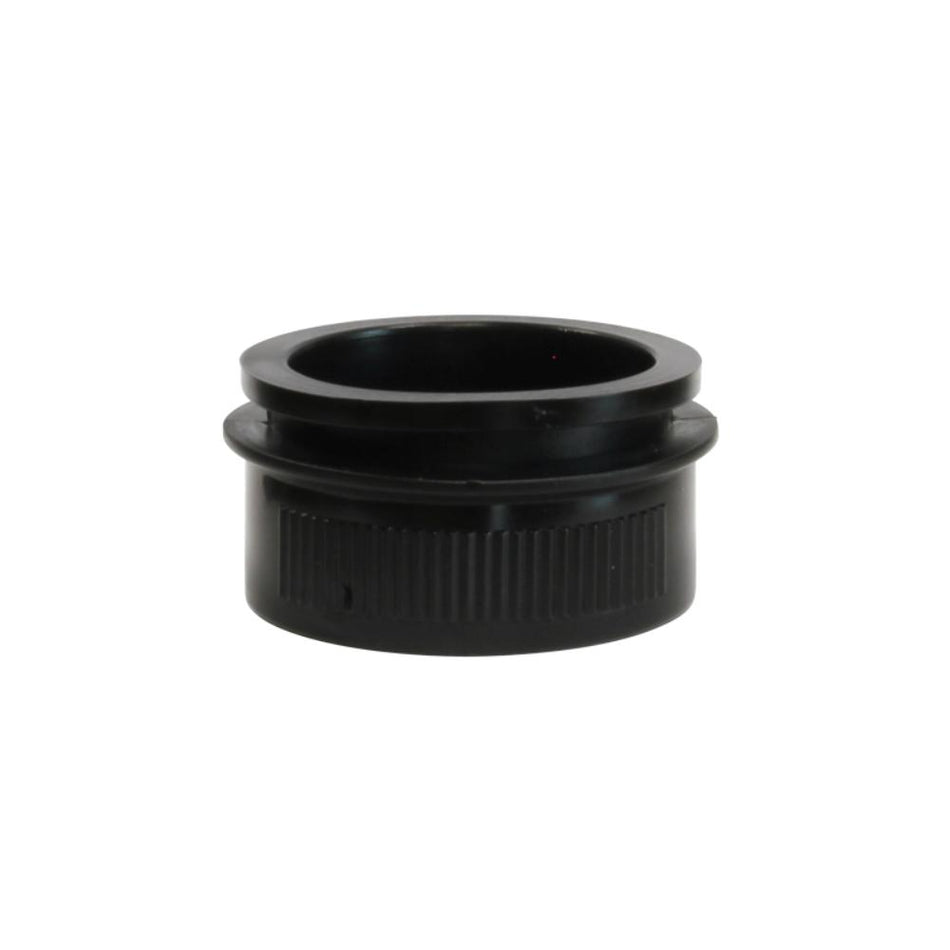 Black cylindrical object on a white background
