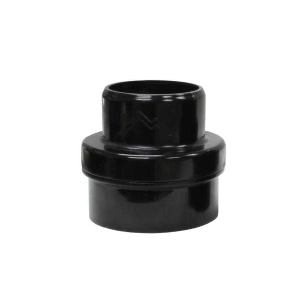 Black plastic fitting on a white background