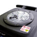 Close-up of a black electronic device with a clear circular component and warning labels on a white background.