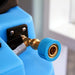 Close-up of a blue and gold pressure washer nozzle.