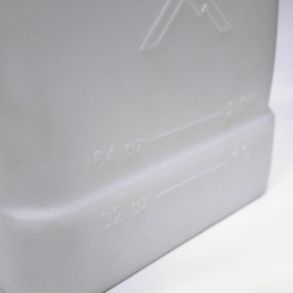 Close-up of a white plastic component with embossed text on a white background
