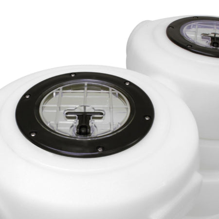White marine fuel tanks with black caps on a white background