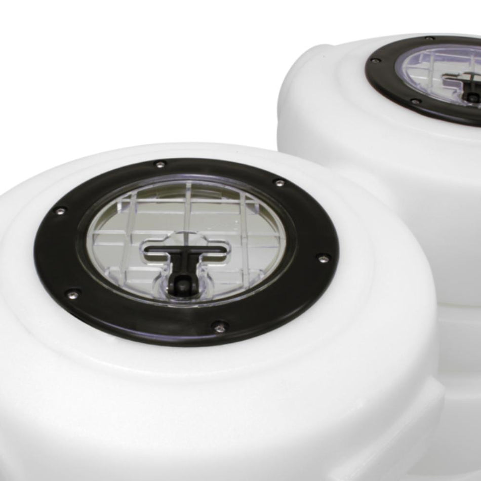 White marine fuel tanks with black caps on a white background