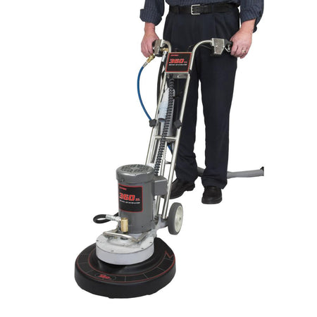 RotoVac360XL Person using a floor buffer on a white background