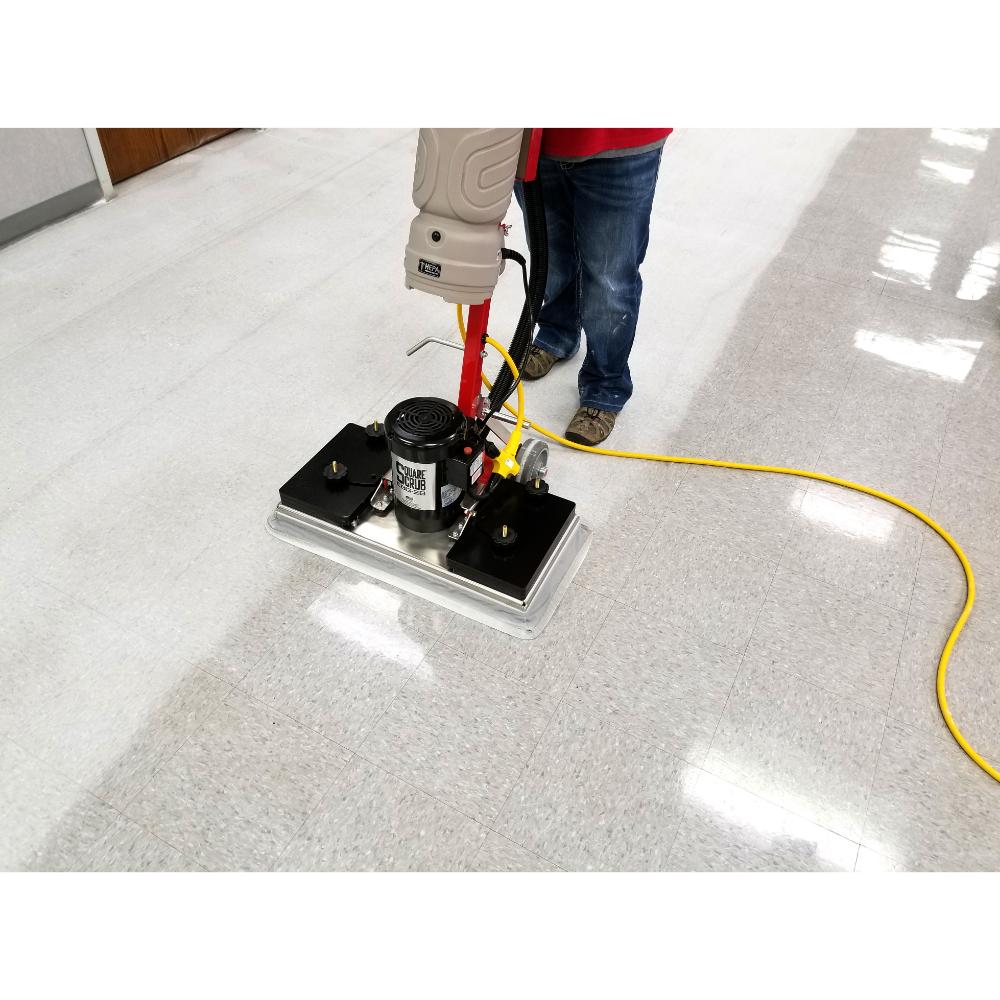 Square-Scrub-Pivot-20c Person using a floor cleaning machine on a polished floor