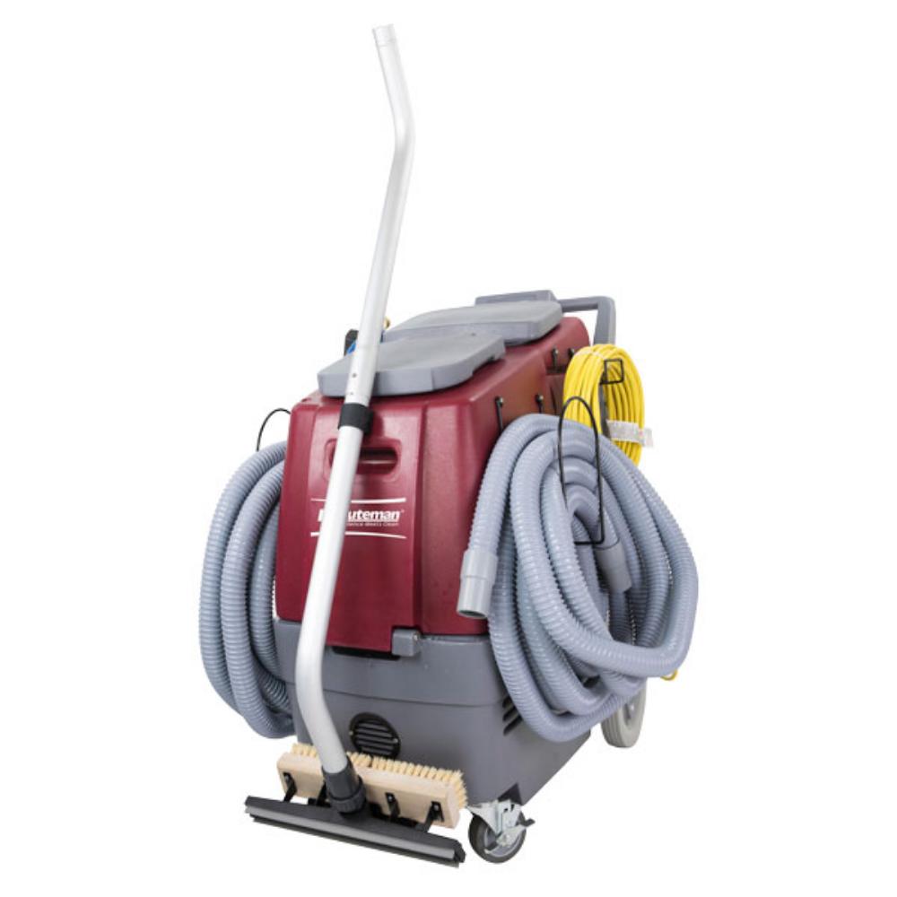 Front view of Total restroom system by minuteman with vacuum attachement and hoses on the side. 