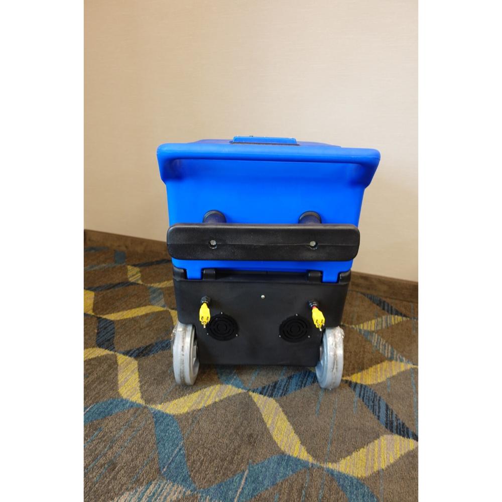 Back of the Blue and Black Cobra 8.0 carpet extractor by U.S. Products displaying the dual electric cord hook ups.