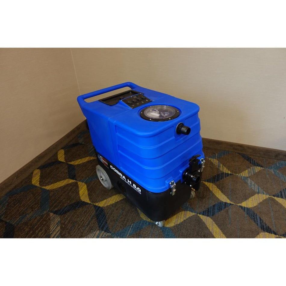 Top of the blue and black U.S. Product Cobra 8.0 Carpet extractor. Displays the multi setting switch board and water fill hole.