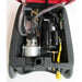 Inside the hood of a Neptune 1200H Carpet extractor. Displays the electrical motor and yellow power cords. 