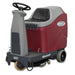 Red and grey minute man max ride 20 riding floor scrubber.